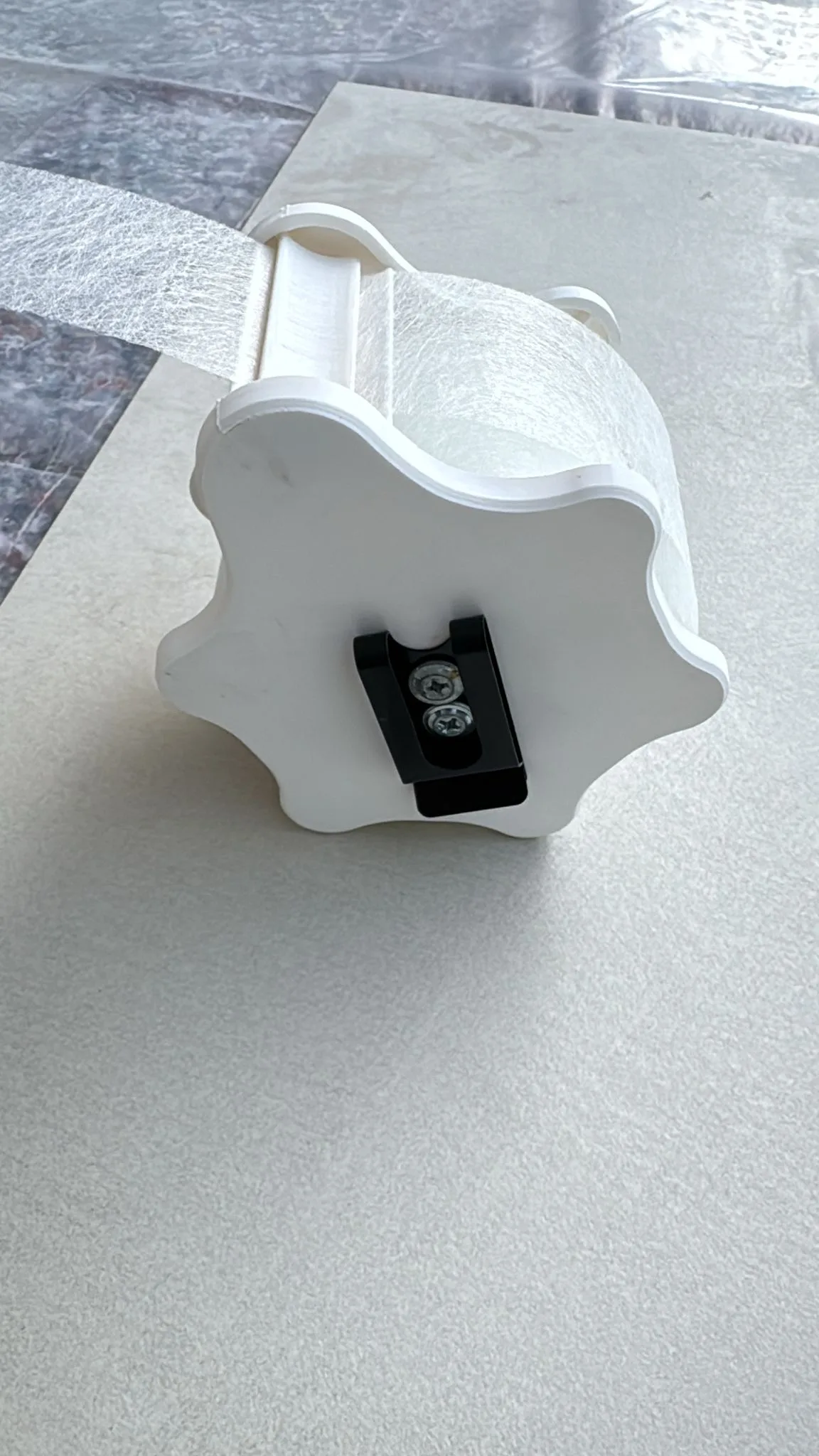 Gancio da cintura integrato sul retro del dispenser VELOBOX
